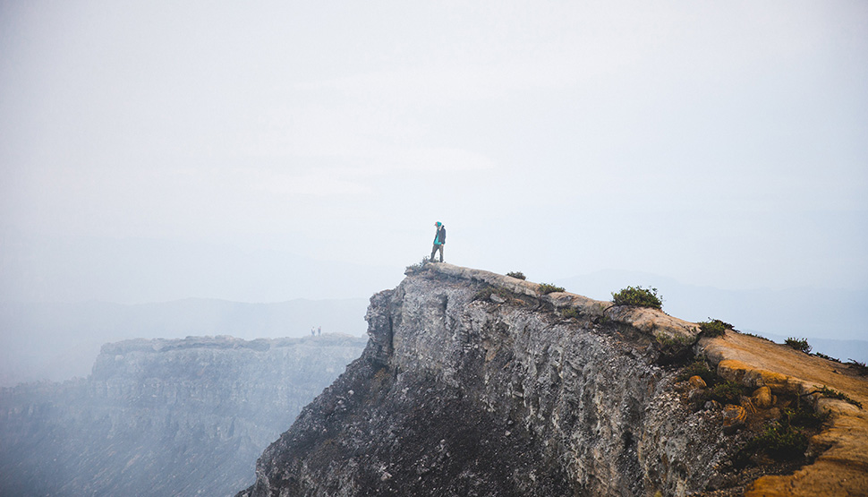 Adventurer on cliff